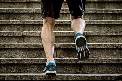 Young Athletic Legs With Sharp Scarf Muscles Of Runner Sport Man
