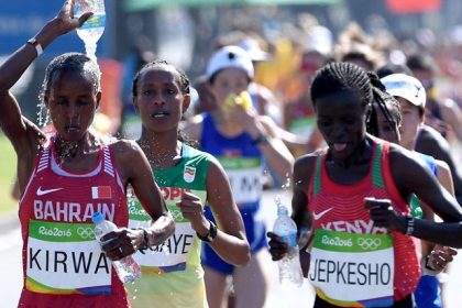 eunice-jepkirui-kirwa-of-bahrain-pours-water-on-her-head-as-news-photo-589475710-1558511546
