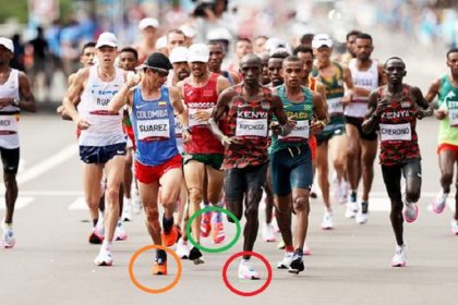 eliud-kipchoge-of-team-kenya-center-competes-in-the-mens-news-photo-1628498390